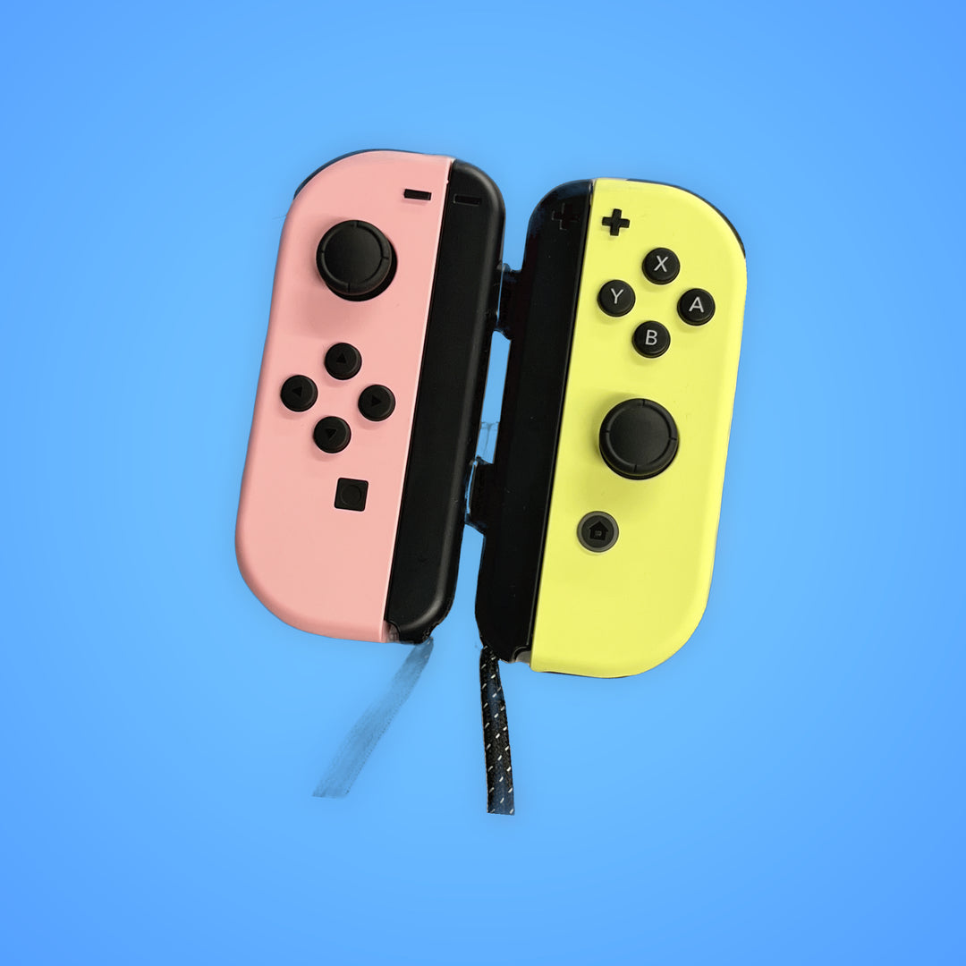 Nintendo Switch Joycons (Pink and Green)